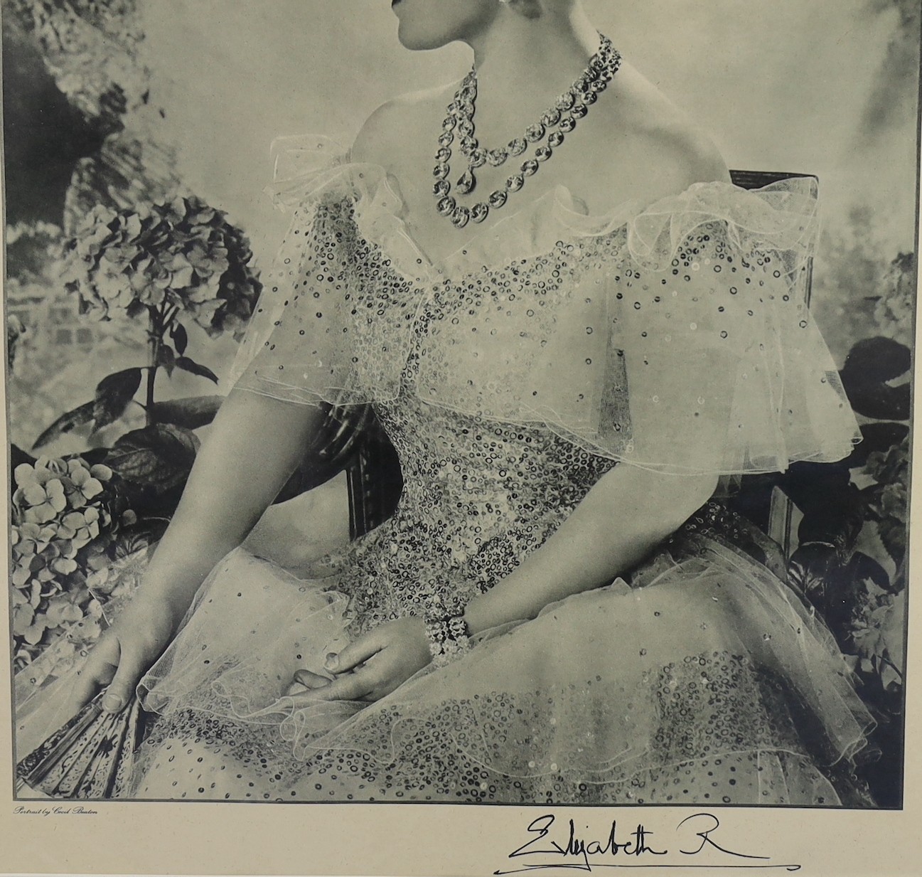 After Cecil Beaton, a signed photo-lithograph of Queen Elizabeth, the Queen Mother, printed for Raphael Tuck & Sons Ltd, overall 49 x 39cm